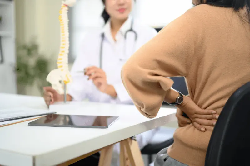 Woman with Back Pain from Degenerative Disc Disease in Miami, FL