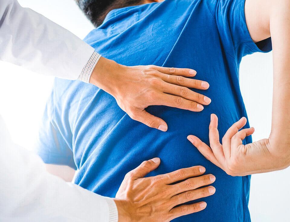 doctor examining man