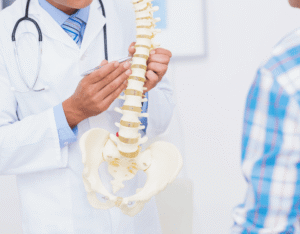 doctor with spine model